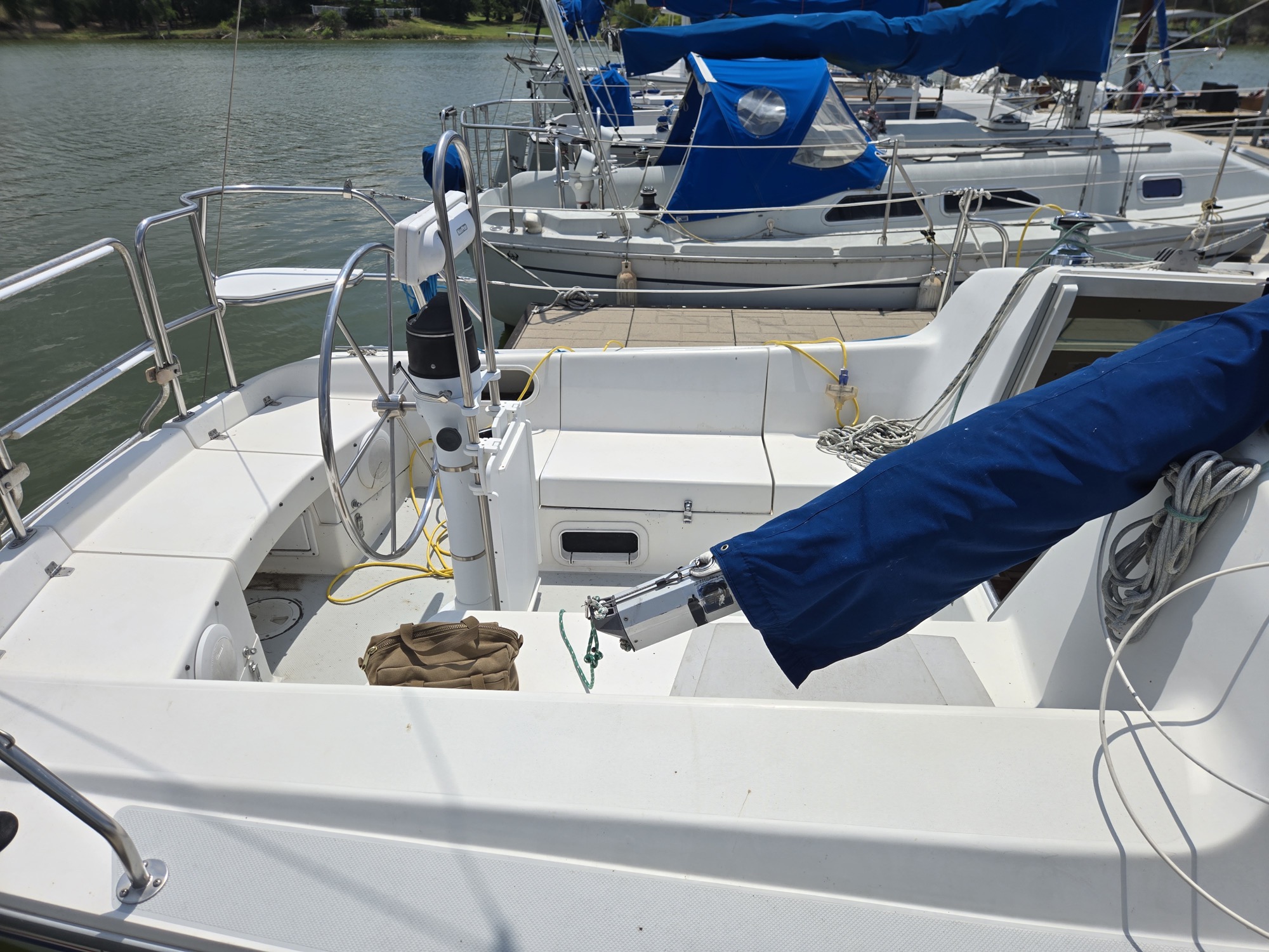 From the quarter, at the old slip. She now lives a few hundred yards away on a permanent berth, having motored there under her own power in July 2026.